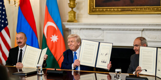 Azerbaijan President Ilham Aliyev, left, and Armenia Nikol Pashinyan sign peace agreement in front of US President Donald Trump aimed at ending decades of conflict at the White House on Friday Aug 8, 2025. Azerbaijan and Armenia fought over Nagorno-Karabakh, an ethnically Armenian enclave in Azerbaijan, in the 1980s and 1990s and violence has flared up in the years since. On Friday, Trump said Armenia and Azerbaijan had promised to stop all fighting forever as well as open up travel, business and diplomatic relations. (White House handout via EYEPRESS)